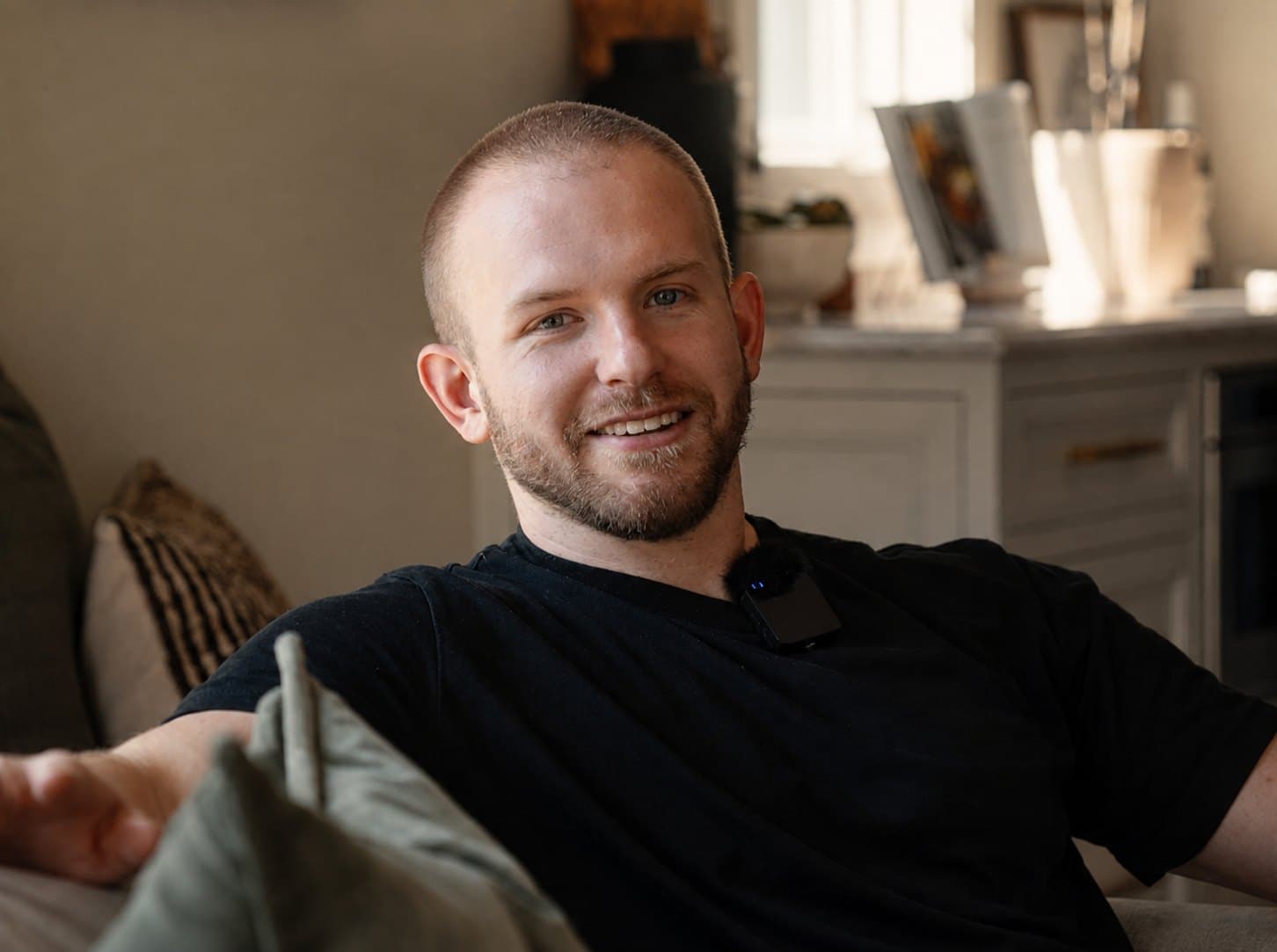 Jackson Carroll seated in a Nashville home during filming