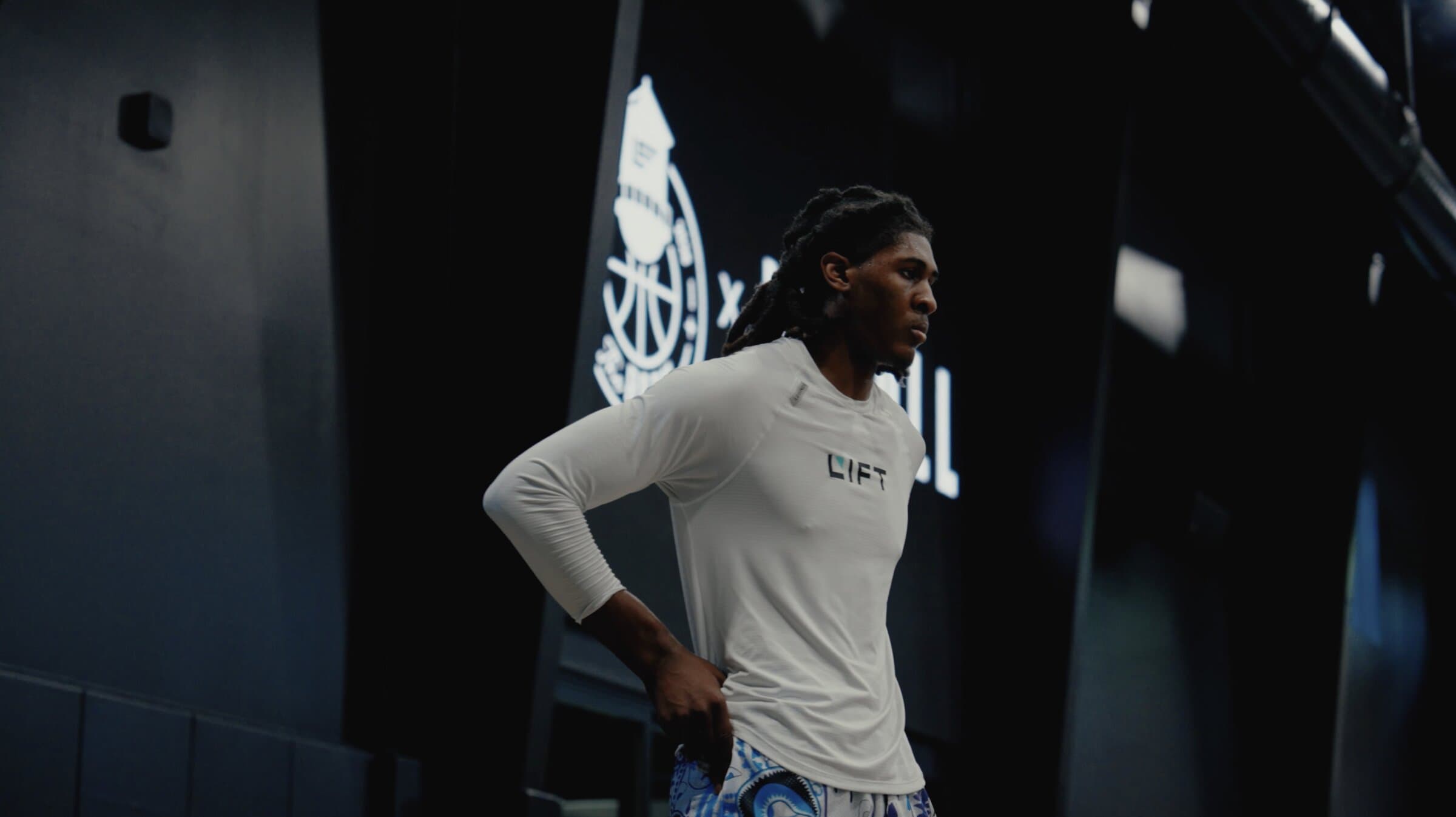 Portrait of a player in the facility tunnel before a session